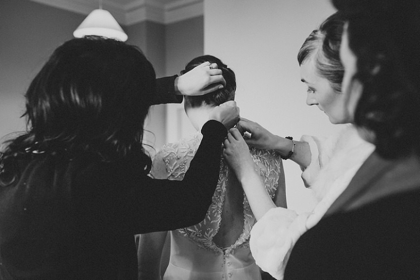 documentary photography of getting ready bride