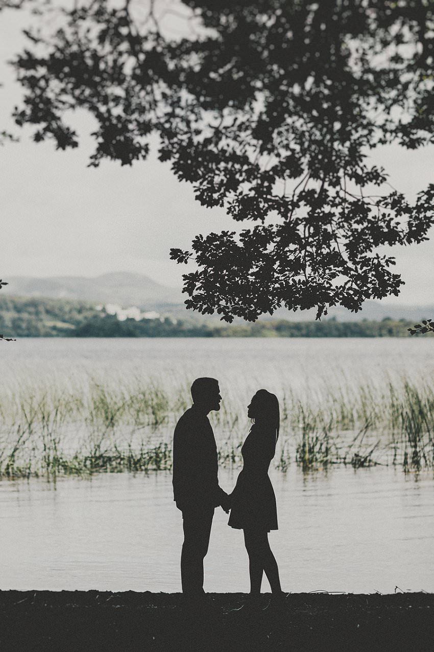 couple standing at the lake fairytale picture