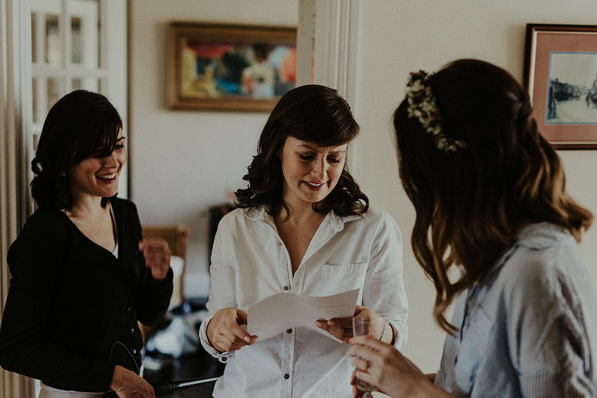 bridesmaids are reading a letter