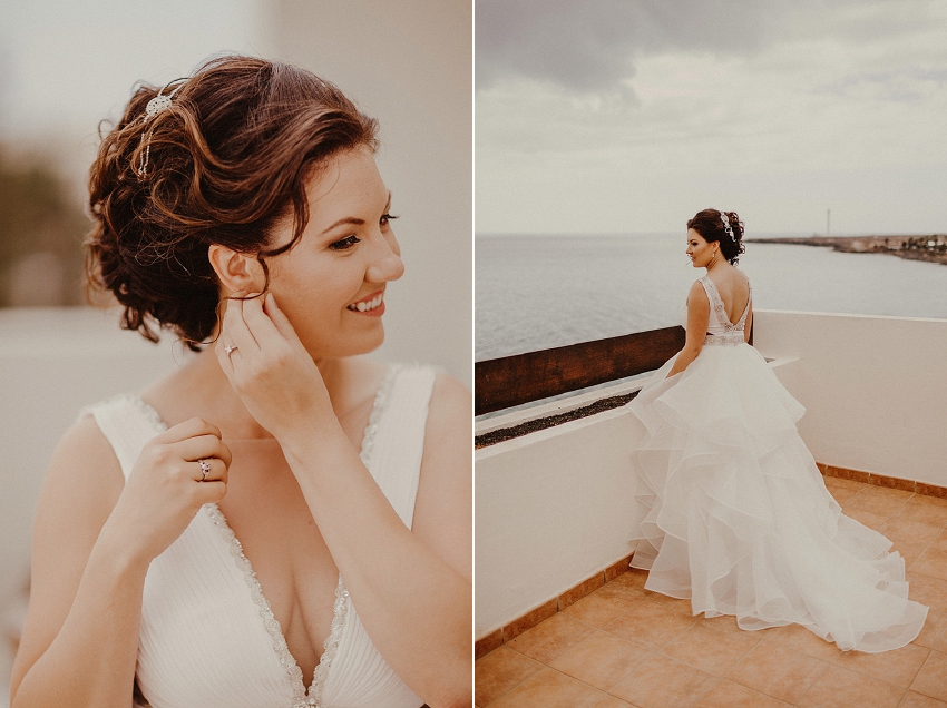 Birde on the terrace in designer wedding dress 
