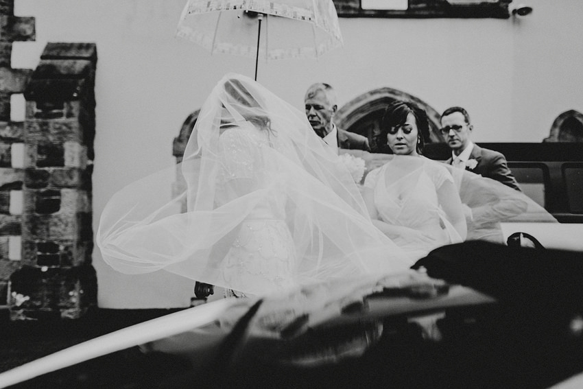 bride's veil is floating in the wind