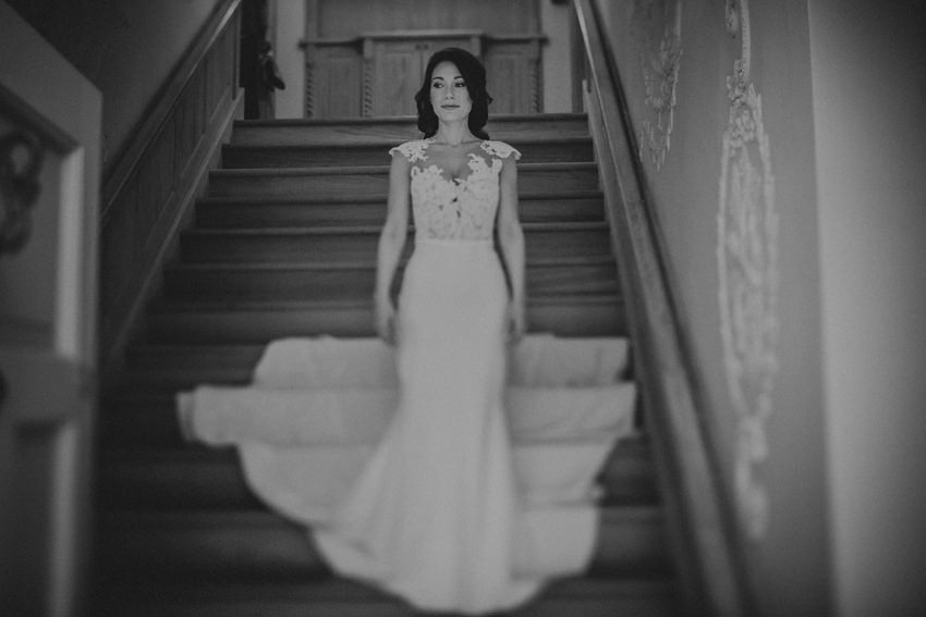 becky's portrait on the stairs aith amazind long dress