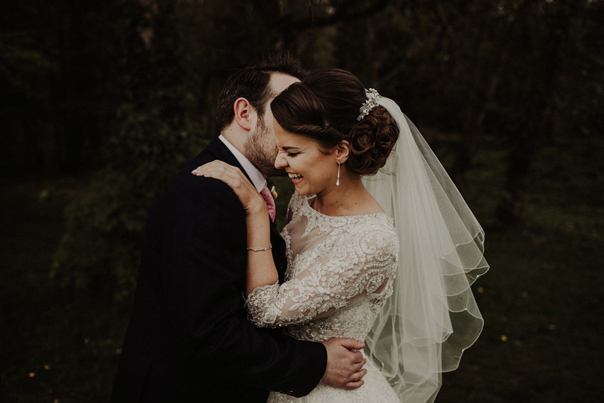 natural style phot of Groom and bride laughing 