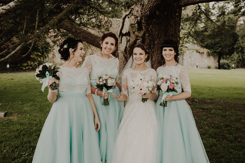 natural group pictures of bridesmaids with bride, beautiful blue dresses