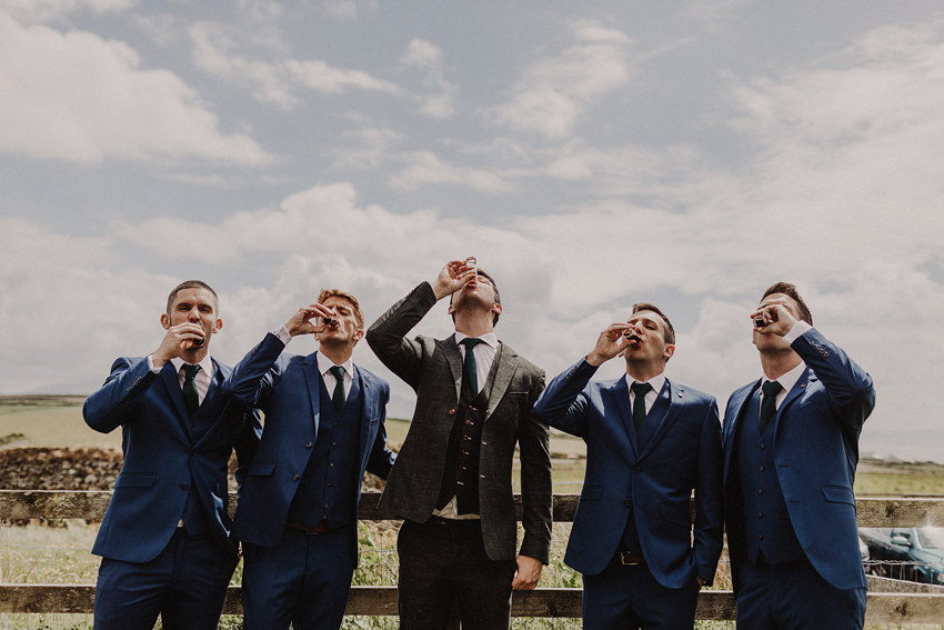 groom and lads having a toast with jagermeister