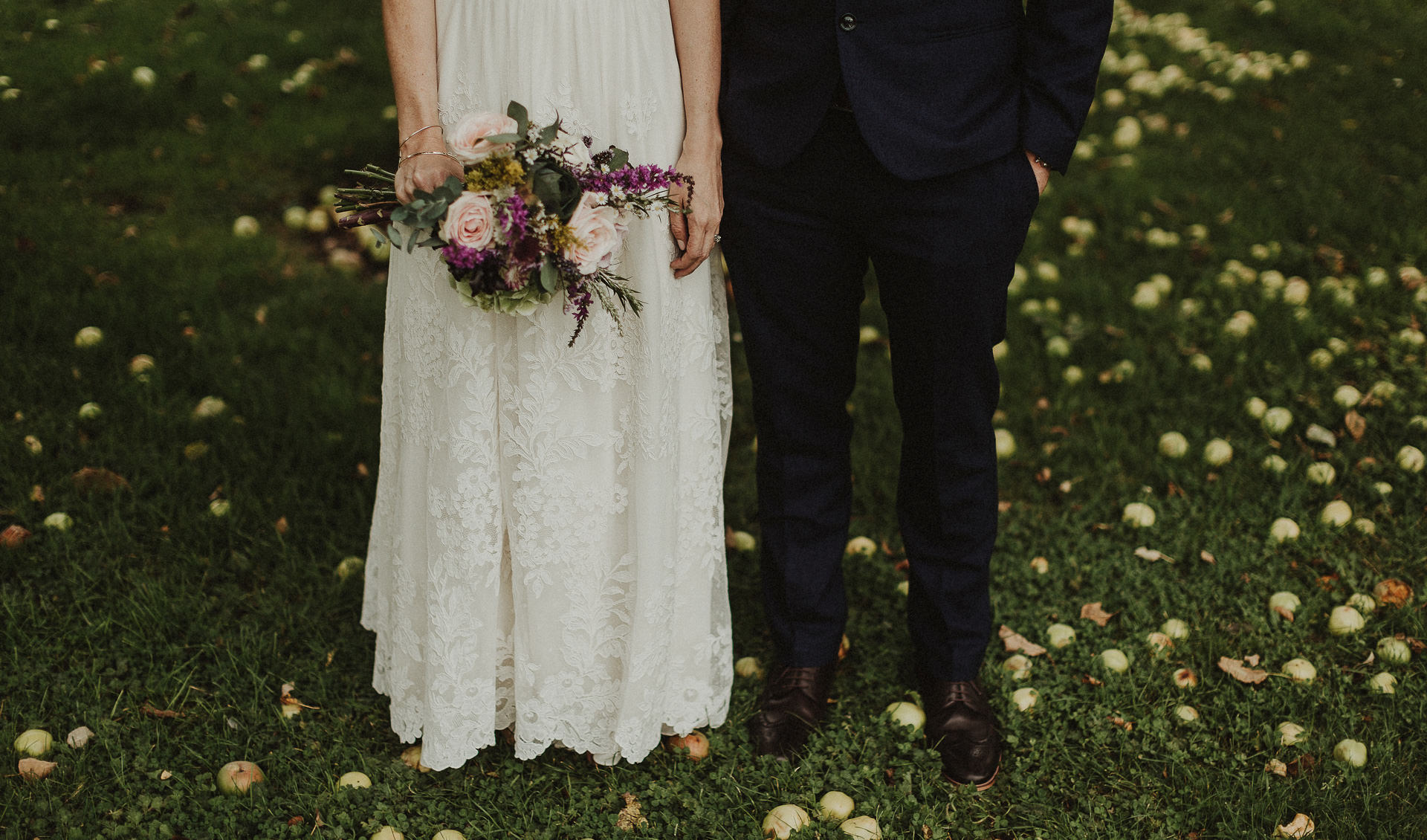 A laid back wedding at The Millhouse Slane | Roisin & Sean 6 The millhouse slane wedding and slideshow - roisin and Sean standing under the tree with fallen apples around them